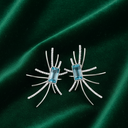 Celeste Radiance Blue Topaz & Crystal Burst Earrings