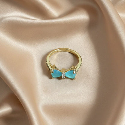 Gold Blue Gemstone Bow Ring with Crystal Accents